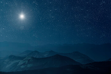 the star shines over the manger of christmas of jesus christ.