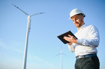 Power engineer are working with wind turbines.