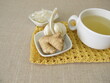 A cup of tea with garlic peel and ginger