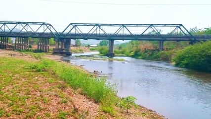 Wall Mural - Pai Memorial Bridge from the Pai river, Thailand