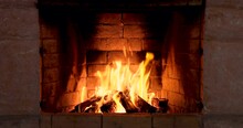 The Fire Is Burning In The Fireplace