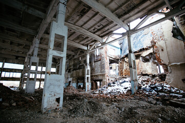 Wall Mural - Abandoned ruined large industrial hall with garbage waiting for demolition