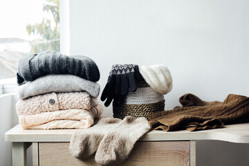 Wall Mural - Winter clothes and accessories for winter season background concept