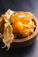 Poster - Physalis peruviana. Cape Gooseberry or ground cherries fruit in bowl.