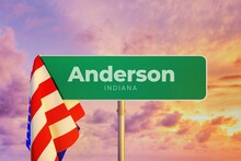 Anderson - Indiana/USA. Road Or City Sign. Flag Of The United States. Sunset Sky.