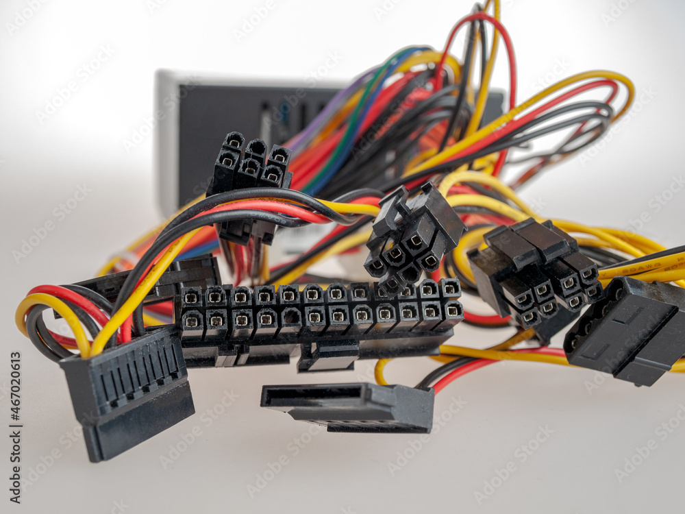 Power supply for a computer with connectors and cables for connecting ...