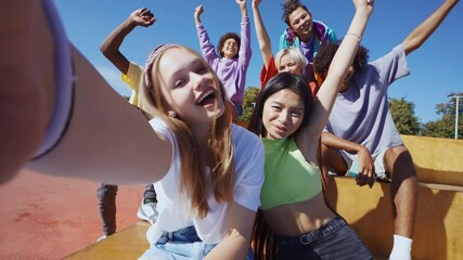 Wall Mural - Group of teens having fun outdoor