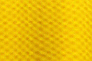 Yellow color sports clothing fabric football shirt jersey texture and textile background.