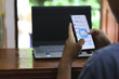 © captain - close up woman holding smartphone and checking email online on web with virtual interface technology concept
