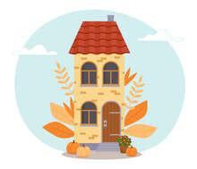 Cute Cartoon House With A Red Roof, With Leaves Around, Pumpkins And Flowers In A Pot. Vector Illustration In Flat Style