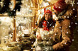 © Syda Productions - family, winter holidays and celebration concept - happy mother, father and little daughter buying wreath at christmas market on town hall square in tallinn, estonia over snow