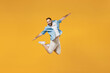 © ViDi Studio - Full body young smiling happy man 20s wear blue shirt white t-shirt jump high with outstretched hands like flying scream isolated on plain yellow background studio portrait. People lifestyle concept.