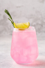 Refreshing pink drink or cocktail with ice