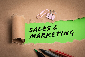 Canvas Print - SALES AND MARKETING. Torn paper and office supplies