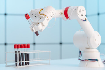 Sticker - Robot arm with test tube for biological experiments in laboratory