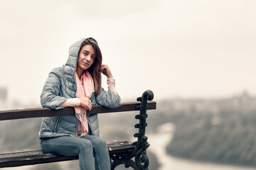 Canvas Print - Shallow focus of a caucasian female with an autumn outfit posing on a blurred background