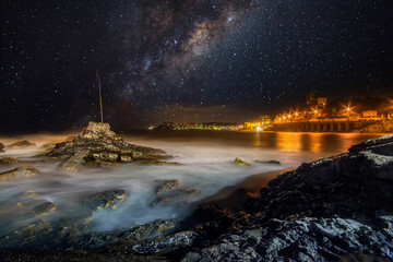 Wall Mural - Milky Way on the rocks of Quarto dei Mille