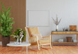 © Johnstocker - 3D mockup photo frame with houseplant in living room rendering