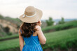 © omelnickiy - young girl in a straw hat with large brim on mountain slopes