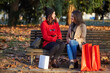 © Stocked House Studio - couple of young women walking after shopping before Christmas