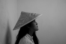 Grayscale Portrait Of Woman Wearing Asian Conical Hat