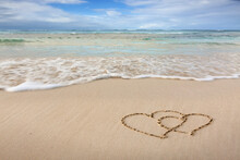 Two Love Hearts On The Caribbean Beach.