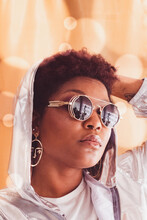 Woman In Light Hoodie Wearing Silver Framed Aviator Sunglasses