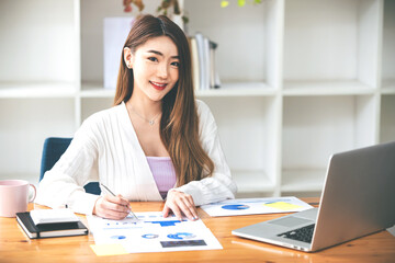 business woman work in the business office on the desk