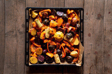 Wall Mural - roasted vegetables with herbs and spices