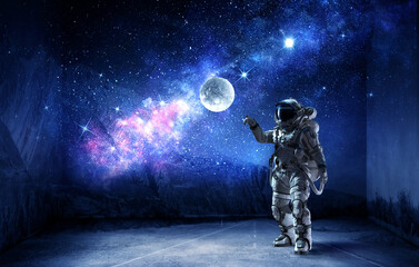 Wall Mural - astronaut at spacewalk . mixed media