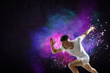 Fototapeta Sport - Portrait of a fitness man running on a colourful background