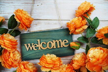 Welcome Sign Hanging On Wooden With Flower Bouquet Decoration