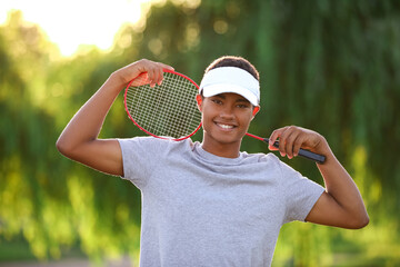 Wall Mural - Young African-American badminton player outdoors