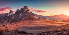 Panoramic Morning View From The Top Of Giau Pass Of Famous Ra Gusela Summit. Picturesque Autumn Sunrise In Dolomite Alps, Cortina D'Ampezzo Location, Italy, Europe. Beautiful Autumn Scenery..