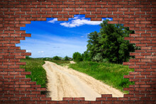 Road Behind Red Brick Wall With Punched Hole, Freedom And Liberation Concept