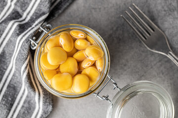 Poster - Pickled yellow Lupin Beans in jar.