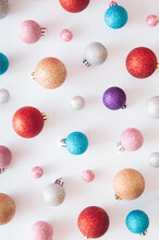 Christmas Background Pattern Made Of Christmas Baubles. Colorful Christmas Balls. New Year Flat Lay Holiday Concept