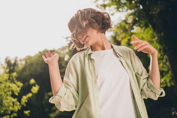 Poster - Photo portrait young girl with bob hair dancing relaxing on sunny summer street wearing casual clothes