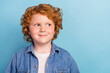 © deagreez - Photo of curious dreamy cheerful small foxy boy look empty space wear denim jacket isolated blue color background