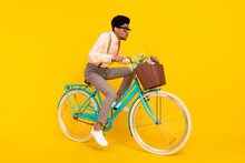 Full Length Body Size Photo Man Riding Bike With Flowers Basket In Glasses Isolated Vivid Yellow Color Background
