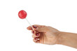 the girl holds the candy chupa chups isolated on a white background. Sweets, pleasure, lollipop