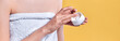 © Olena Apetroaiei - Closeup shot of hands applying moisturizer. Beauty woman holding a glass jar of skin cream.