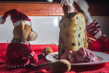 Wall Mural - Panettone with strawberry ice cream with red background and copy space, Christmas concept