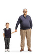 © Ljupco Smokovski - Full length portrait of a grandfather holding hand of a schoolboy