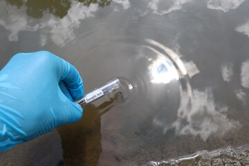 Poster - Collect samples of wastewater from industrial canals in test tube