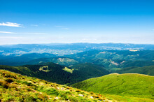Beautiful, Summer Slopes Of Mountains Covered With Green Young Grass Against The Blue Sky, Travel. High Quality Photo