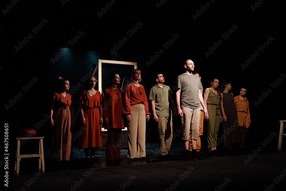 Actors and actresses perform a modern performance on the stage of the ...