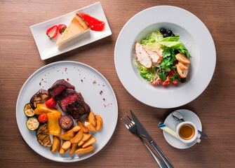 Poster - Food. Set of dishes on the table. On a wooden background. Top view. Copy space.