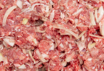 Poster - Minced meat and onions as a background.