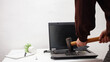 © Valeriia - man office worker smashed a laptop, destroyed a computer. Anger, hatred, irritation. Error, brake, malfunction, does not want work. Bad emotions. depression, not preserved. hammer